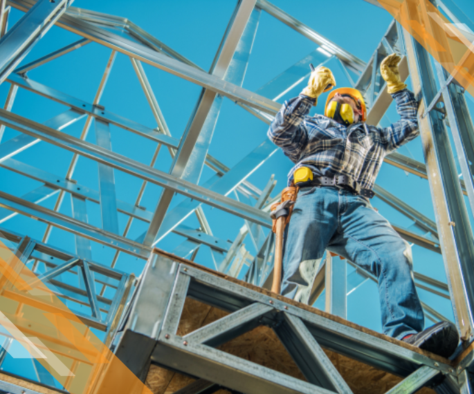 Worker installing ProSTUD steel framing